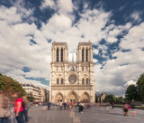 Fototapeta Paryż - Notre Dame de Paris. France. Ancient catholic cathedral on the quay of a river Seine. Famous touristic architecture landmark in summer