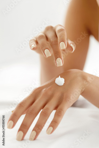 Poster Hand Cream. Close Up Of Woman's Hands Applying Lotion On Skin