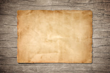 Old Brown Paper On Wood Background For Texture