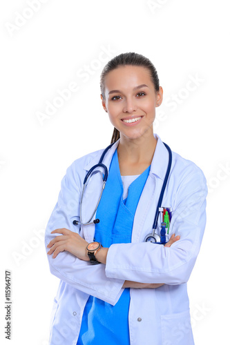 Fotografia, Obraz Woman doctor with stethoscope standing with arms crossed isolated on a white bac