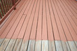 partially painted old wood deck