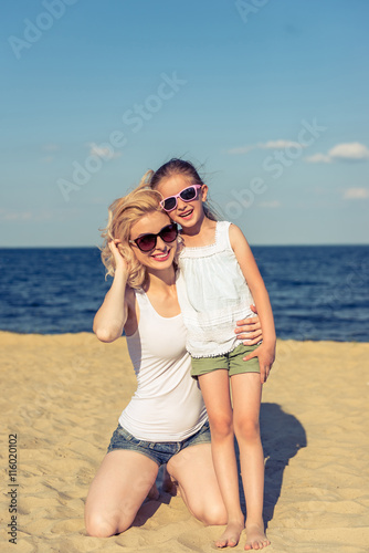 Mother And Daughter In Bikini Sit On Beach Stock Image Image Of My