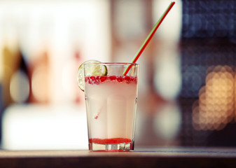 Canvas Print - Glass of cocktail on bar background