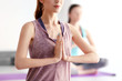 © Africa Studio - Young women doing yoga in gym