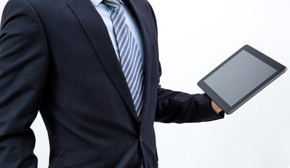 isolated business man hold the tablet on white background
