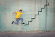 © olly - Jumping on a steep staircase