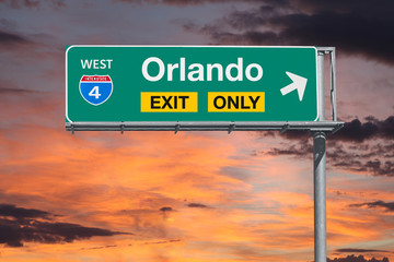 Wall Mural - Orlando Florida Exit Only Freeway Sign with Sunrise Sky