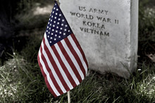 American Flag On A Soldiers Gravesite