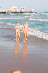 Wall Mural - Happy kids on the beach