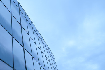 Business office building exterior with glass windows