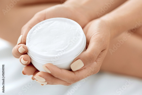 Fotografie, Obraz Skin Care Product. Woman's Hands Holding Beauty Cream, Lotion.