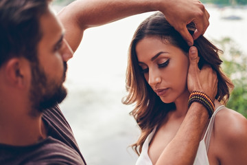 Wall Mural - Man is fixing girls hair