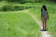 © pummy - little girl walking on green meadow in summer time (Soft tone)