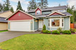 © Iriana Shiyan - Classic American house with red and blue trim
