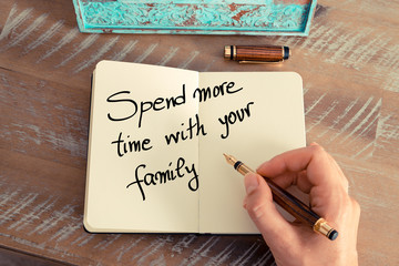Wall Mural - handwritten text spend more time with your family