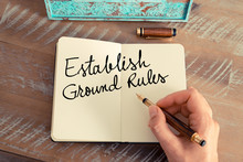 Handwritten Text Establish Ground Rules On Notebook