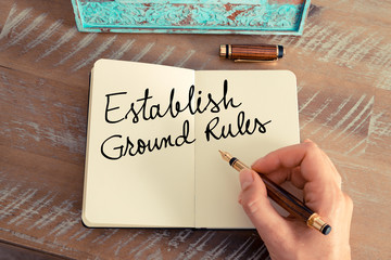 Wall Mural - handwritten text establish ground rules on notebook