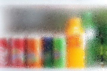 blurred of soft drink and beverage look through the freezer