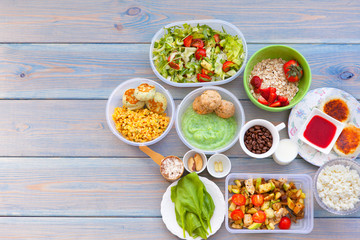 Fitness healthy food on a wooden table in a lunchbox