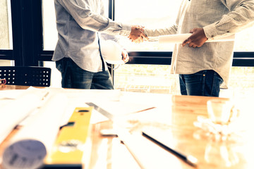 engineer people shaking hands in office, engineering concept