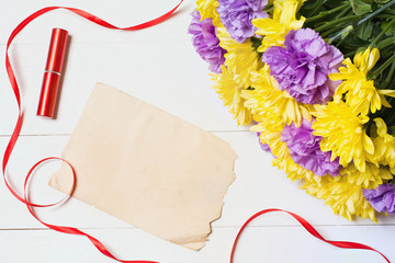 Old paper sheet with empty copyspace and beautiful flowers on wh