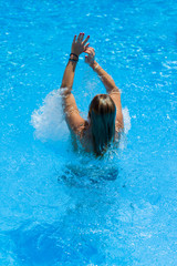 woman in bikini at the pool