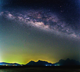 Wall Mural - milky way galaxy over mountain, thailand.