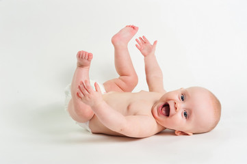 Wall Mural - Portrait of adorable baby girl isolated on white background