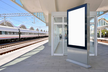 Vertical Light Box Poster Mockup At Train Station, High Resolution. 