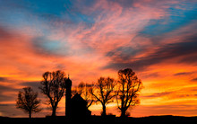 Early Morning Sunrise Dawn With Silhouette Small Church Or Chapel