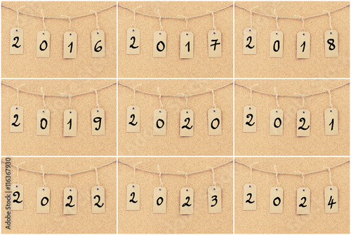 Fotografia Photo collage of vintage grunge tags with years from 2016 to 2024