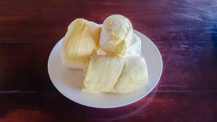 durian on wood table selective object