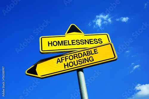 Fotografía Homelessness vs Affordable Housing - Traffic sign with two options - Appeal to provide social housing for poor people