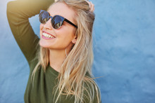 Cheerful Young Woman In Sunglasses