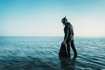 Wall Mural - Man in a diving suit