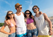 © Viacheslav Yakobchuk - Delighted smiling friends having fun on the beach