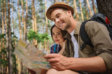 Wall Mural - Joyful loving couple relaxing in nature