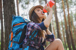 © Yakobchuk Olena - Pretty female tourist making break