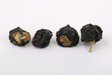 Traditional Chinese  black herbs dried wolfberry close up 