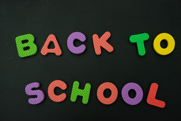 back to school on black chalkboard