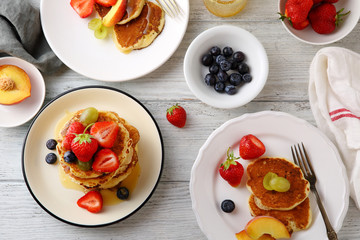 Wall Mural - breakfast table set with pancakes