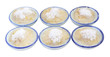 © keerati - Row cup steamed banana cake in cup on white background.