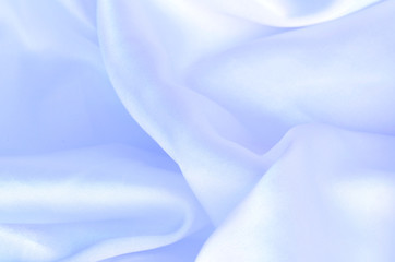 smooth elegant blue silk, satin fabric background texture