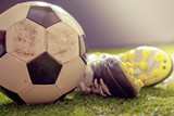 Fototapeta Sport - Shoes & football