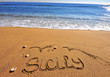 Sicily sign on the beach