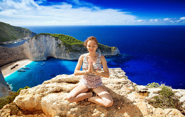 Wall Mural - Traveler on the Background Incredible Navagio Beach or Shipwreck Beach. Zakynthos, Greece.