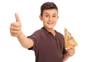 Fototapete - Happy boy holding a slice of pizza