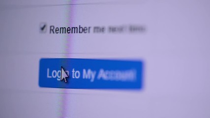 Internet web page account login with mouse cursor, close up