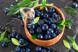 Fototapeta Kuchnia - blueberries on a slate table