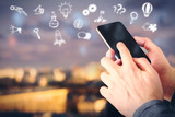 Fototapeta Perspektywa 3d - Smartphone with business icons